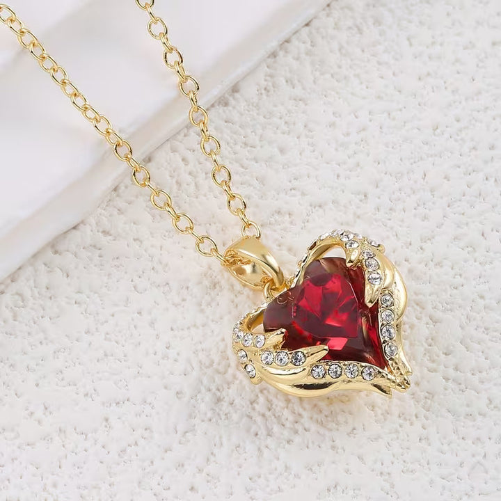 Angel Embrace Red Stone Heart Necklace | Gold-Tone