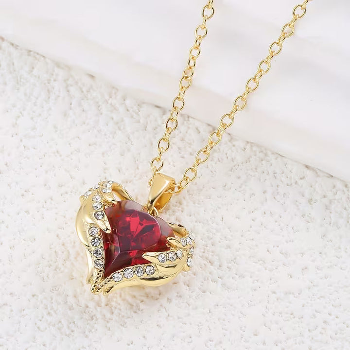 Angel Embrace Red Stone Heart Necklace | Gold-Tone