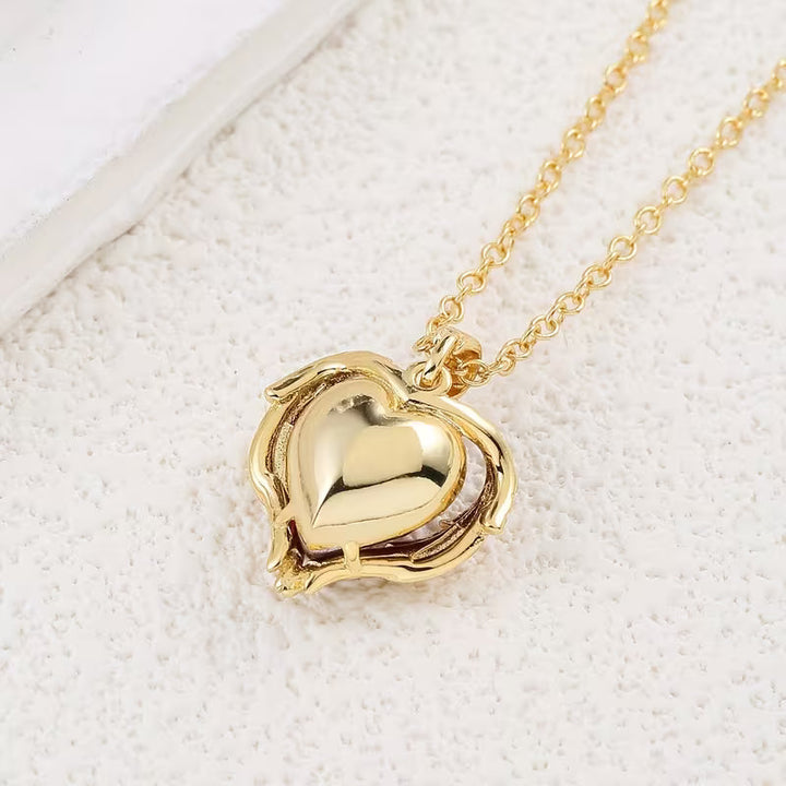Angel Embrace Red Stone Heart Necklace | Gold-Tone